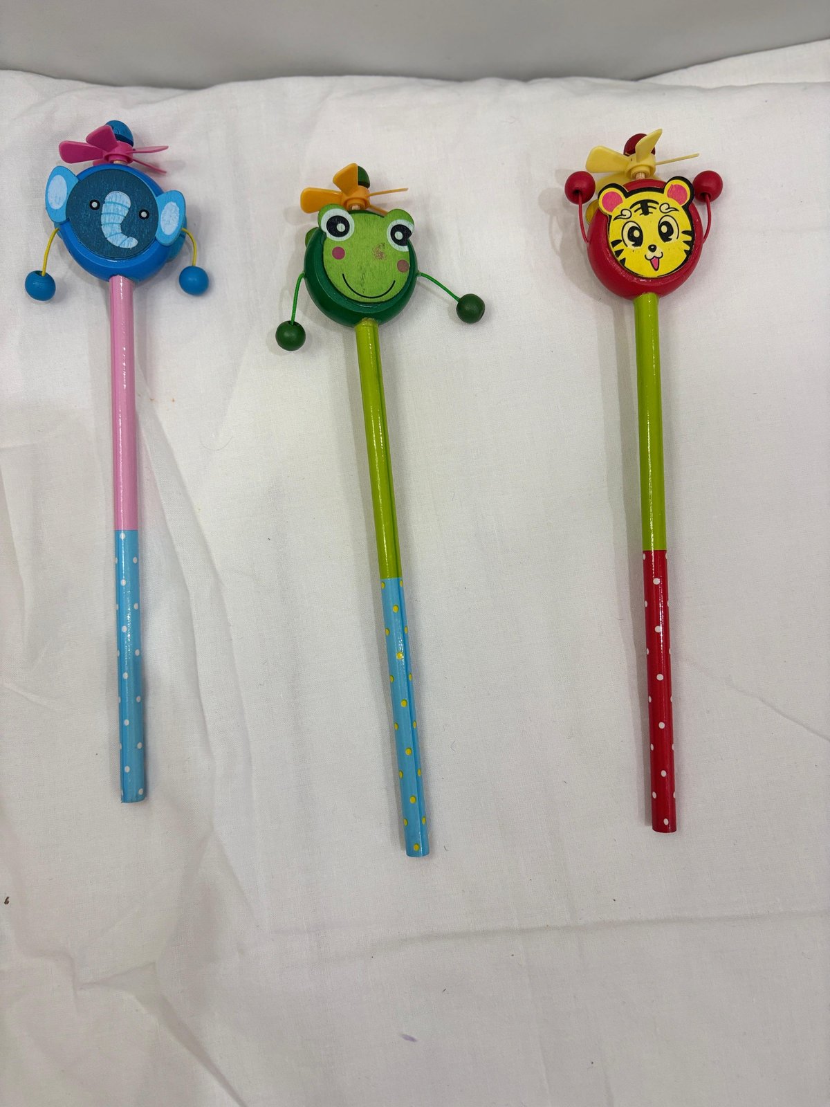 Wooden cartoon shape animals design pensil attached with rattle